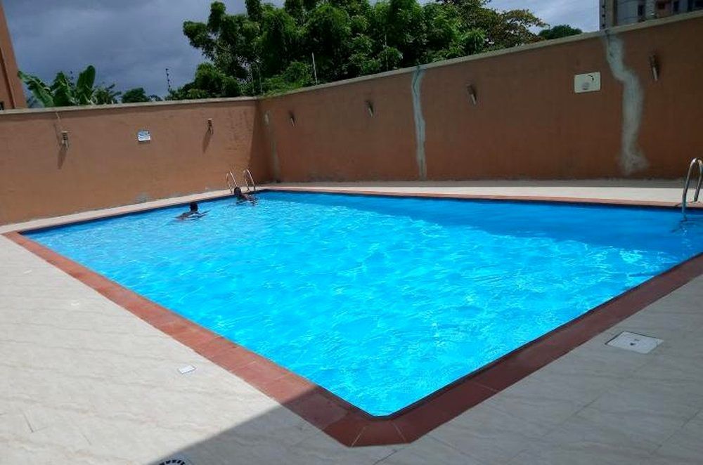 Modern Backyard Pool by AquaCrystal Craft Ltd Nigeria